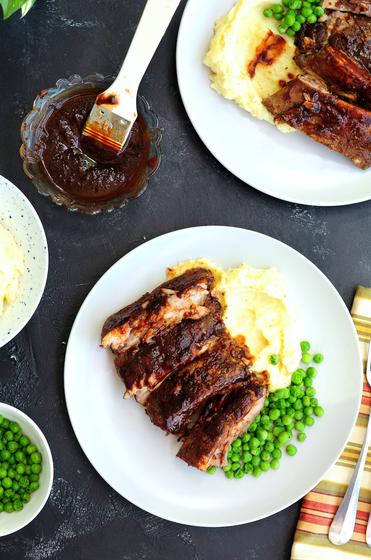 https://www.streetsmartkitchen.com/wp-content/uploads/BBQ-Baby-Back-Ribs-with-Mashed-Potatoes-and-Green-Peas-2.jpg?ezimgfmt=rs:372x560/rscb1/ngcb1/notWebP