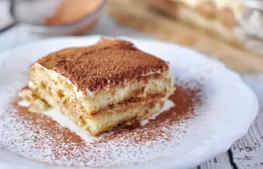 https://www.streetsmartkitchen.com/wp-content/uploads/Classic-Italian-Tiramisu-3.jpg?ezimgfmt=rs:372x241/rscb1/ng:webp/ngcb1