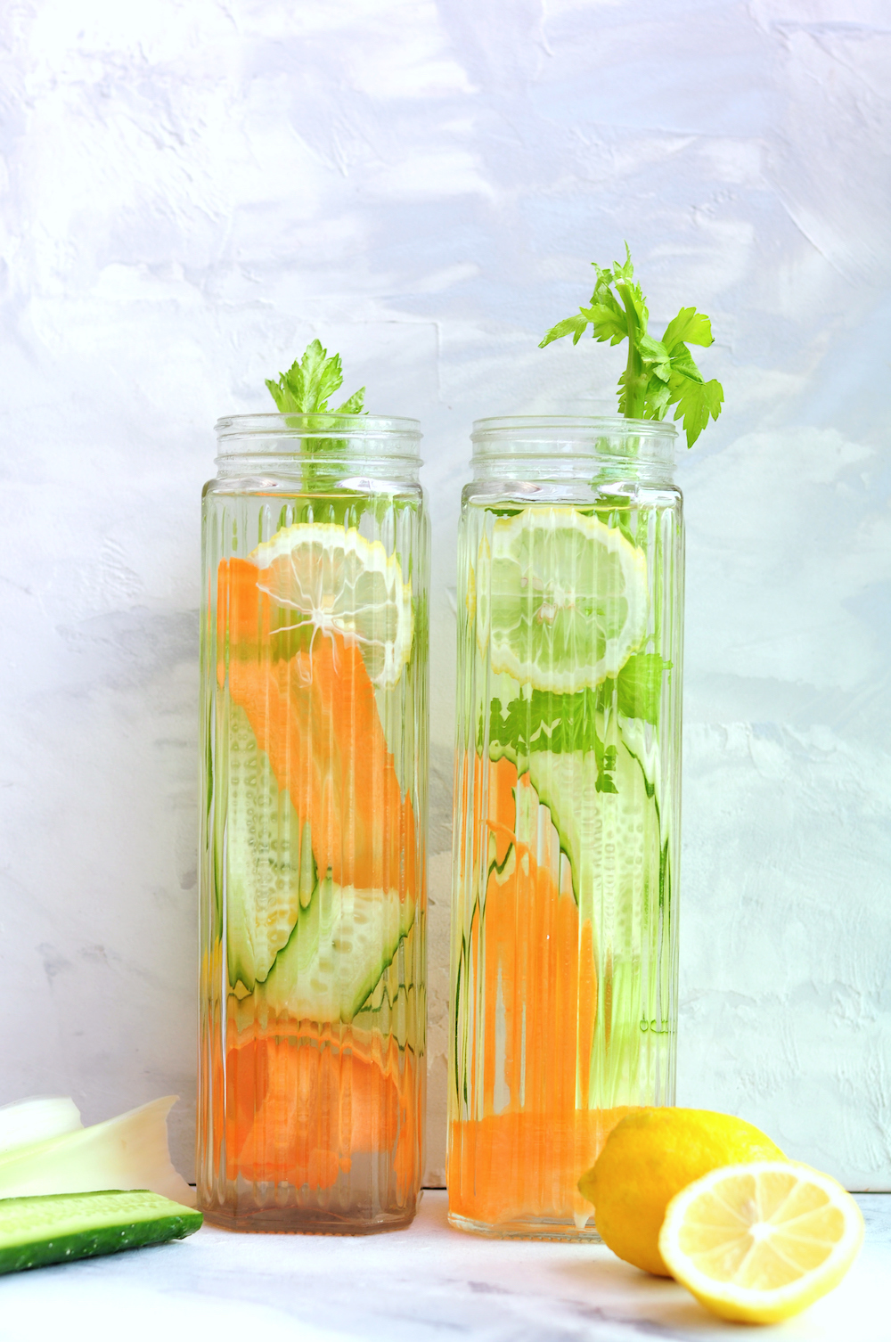 https://www.streetsmartkitchen.com/wp-content/uploads/Cucumber-Lemon-Water-with-Carrots-and-Celery-2.jpg