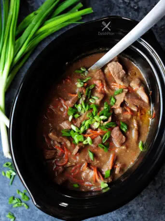 Mongolian beef recipe made gluten free in a slow cooker! This is a perfect recipe for slow cooker beginners or for those who just want a simple dump meal.