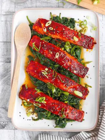 Gochujang salmon is a deliciously spicy dish that’s easy to make. Learn two easy cooking methods: oven-broiled or sous vide.