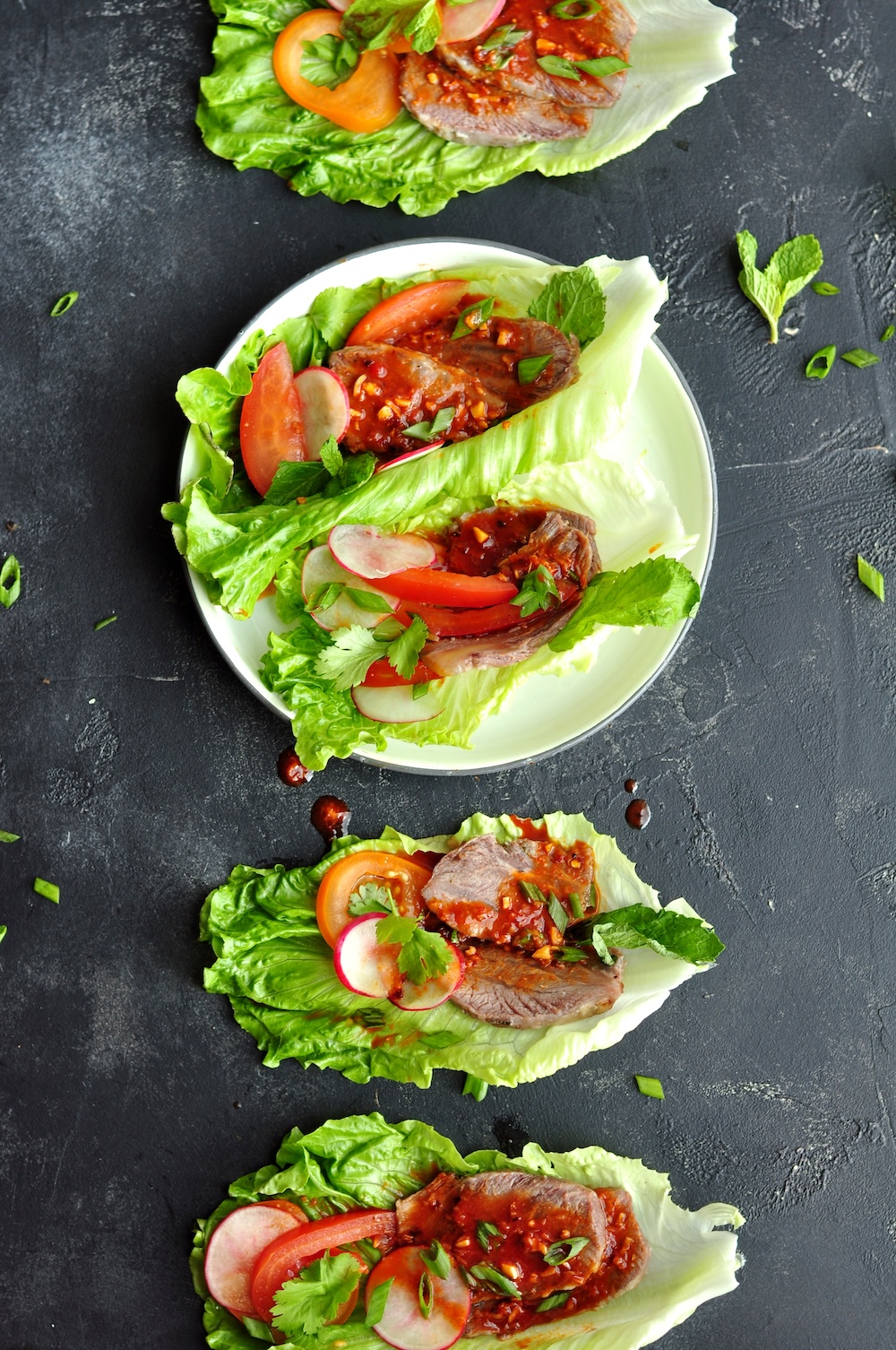 These Korean Beef Lettuce Wraps are made with sous vide beef cheeks or leftover steak coated in a tantalizing Korean bulgogi sauce nestled in crisp lettuce leaves. 