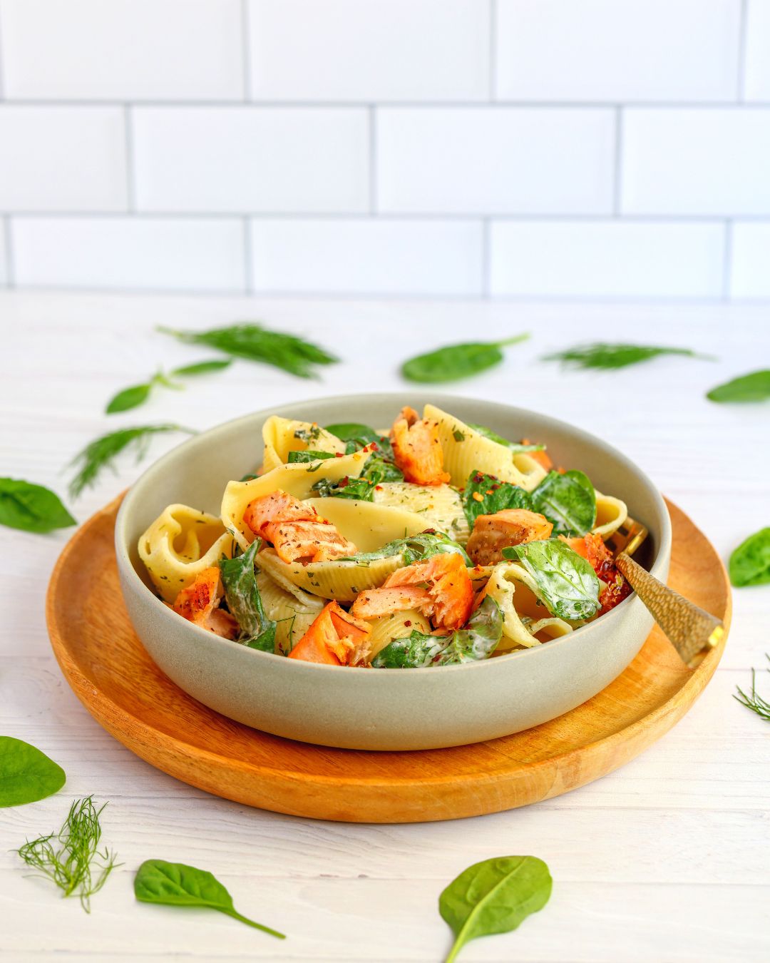 Salmon pasta tossed in a lemon yogurt sauce with loads of fresh herbs and topped with sous vide salmon or smoked salmon. It's a delicious, high-protein meal you can make in 20 minutes.