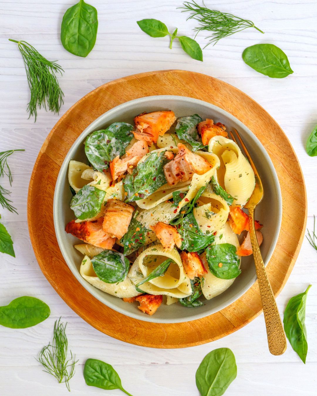 Salmon pasta tossed in a lemon yogurt sauce with loads of fresh herbs and topped with sous vide salmon or smoked salmon. It's a delicious, high-protein meal you can make in 20 minutes.