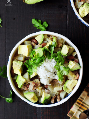 A quick one-pot chili featuring tender pork and a refreshing mojo sauce. This gluten-free pork chili recipe is done in 30 mins from start to finish!