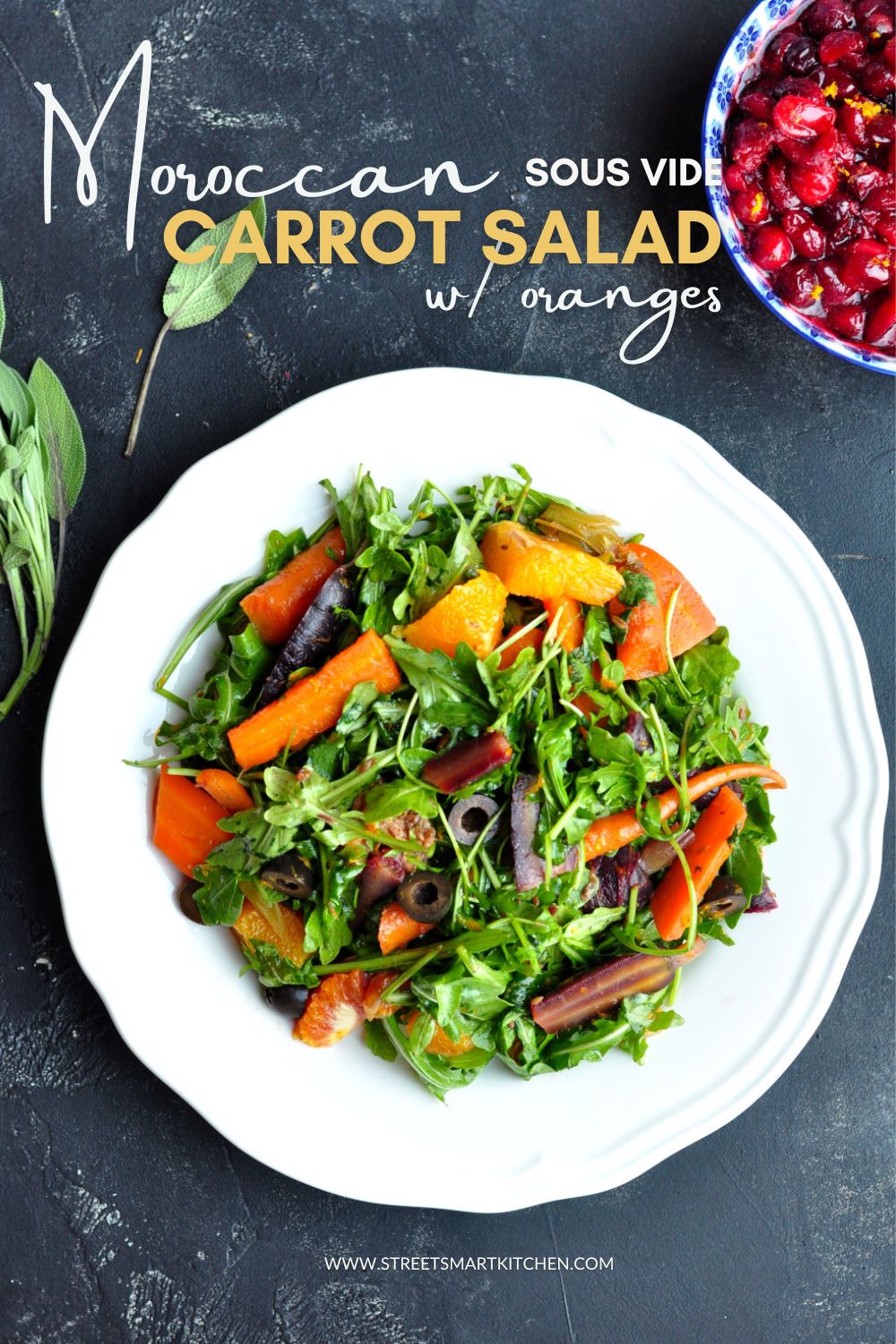 Boldly spiced sous vide carrot salad tossed with oranges and salty olives. It's a refreshing, satisfying, and stunning Moroccan-flavored dish with rainbow colors.