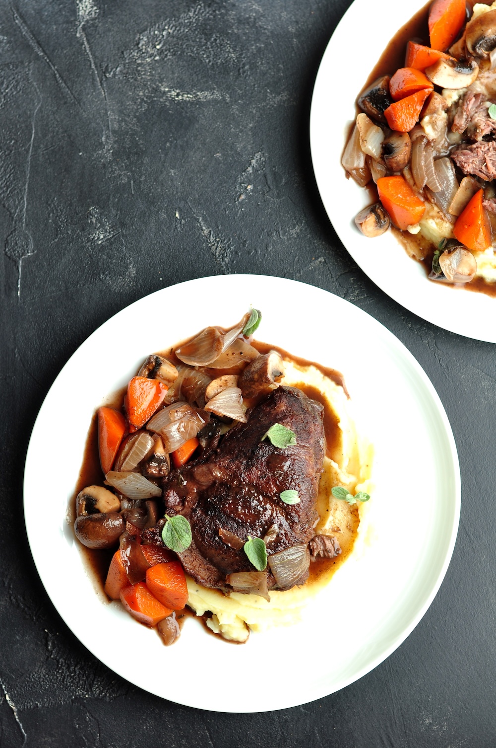 Sous Vide Beef Cheeks with Red Wine Sauce served over mashed potatoes