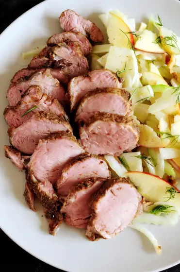 https://www.streetsmartkitchen.com/wp-content/uploads/Sous-Vide-Pork-Tenderloin-with-Apple-Fennel-Salad-2.jpg?ezimgfmt=rs:372x560/rscb1/ng:webp/ngcb1