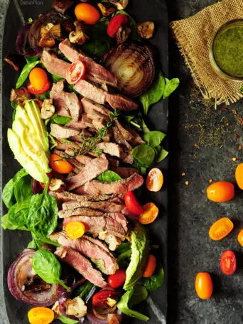 Make salad more exciting by adding succulent steak and chimichurri with this steak salad recipe. You’ll have a healthy and glorious meal in just 30 mins.