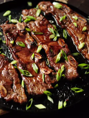 Quick and easy Asian ribs with only 3 ingredients pan grilled on the stove top. This is a great meat option for a busy workday dinner. 