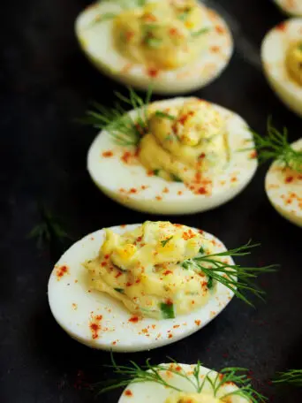 This tuna deviled eggs recipe combines tuna with mayonnaise, Dijon mustard, horseradish, green onion, eggs, and dill to make a deliciously fun appetizer!