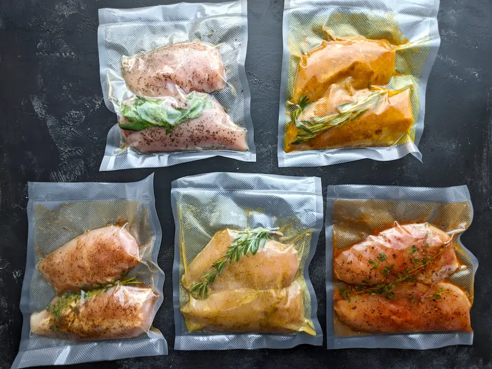 Once the chicken breasts are seasoned, put them in sous vide bags and vacuum seal them.